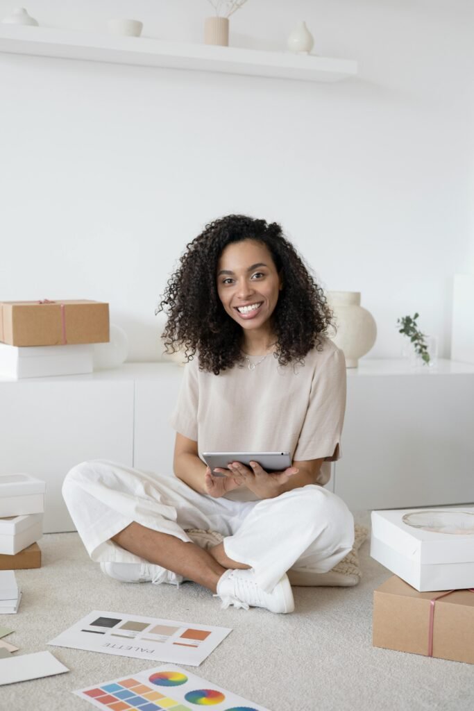 Entrepreneur using tablet to streamline workflow through AI Business Automation Services